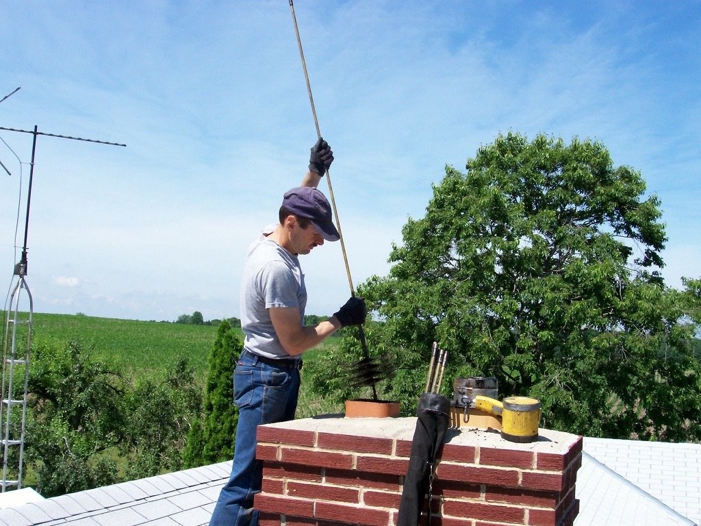 Rooftop chimney sweeping